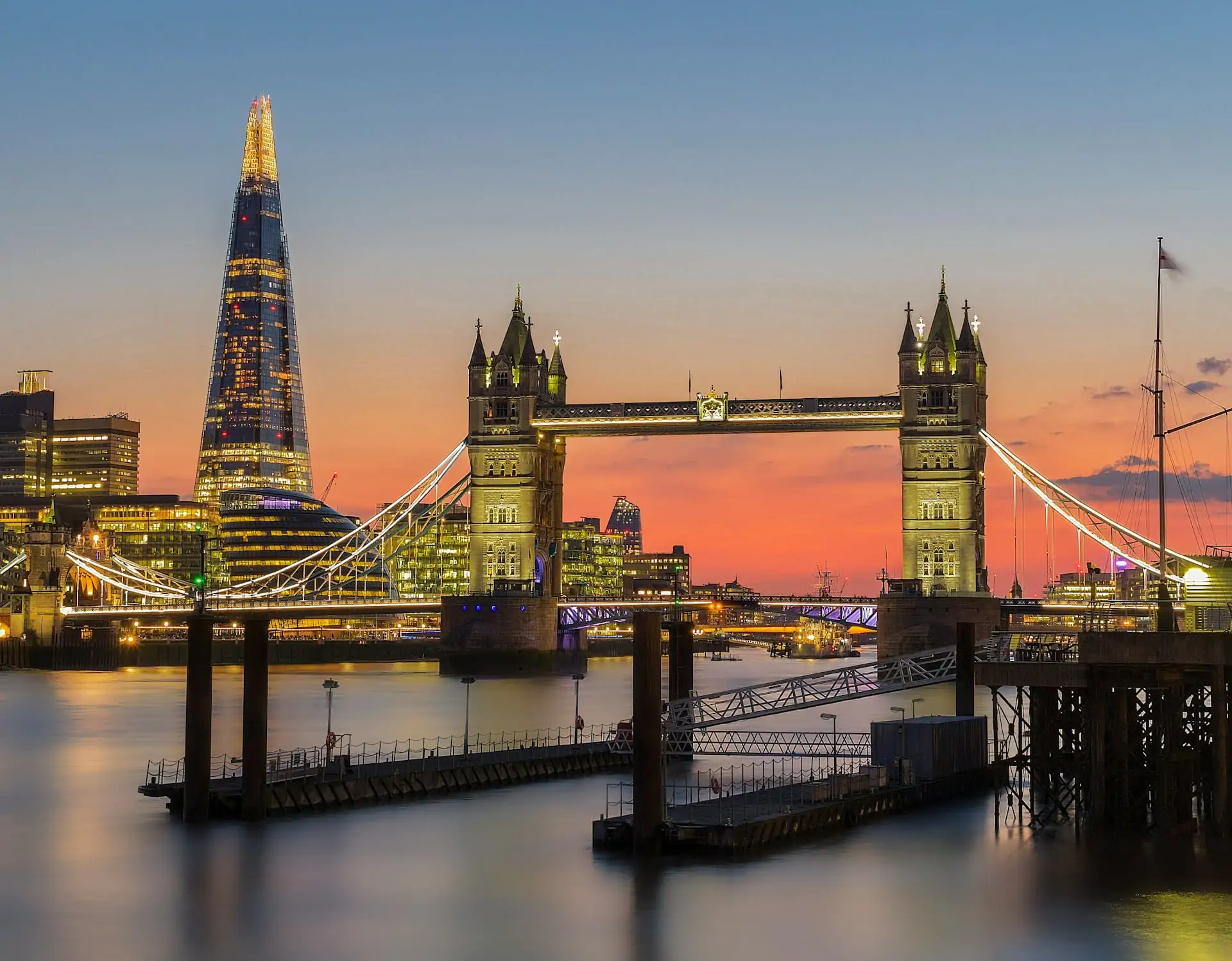Tower Bridge and The Shard skyscraper on the River Thames at sunset, London